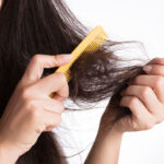 hair tangled in brush