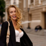 smiling woman elegant black suit